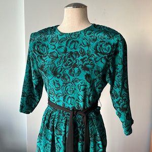 Vintage teal dress with a bold rose print size 6